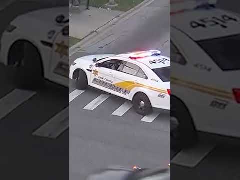 Hero cop saves choking woman on roadside in dramatic rescue