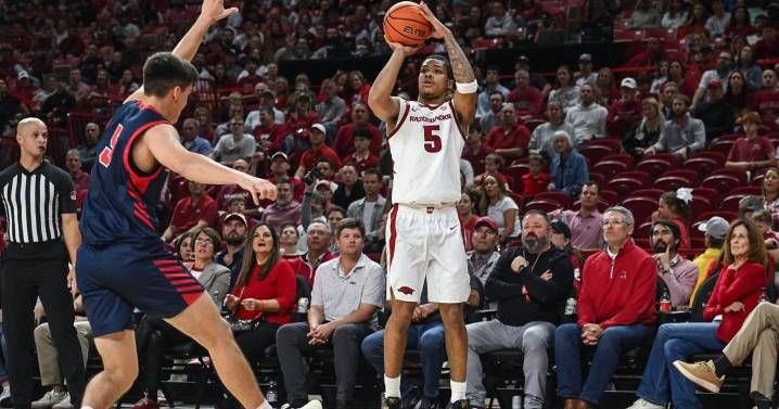 No. 21 Arkansas holds off Samford 79-75 behind freshman guards