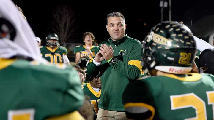 Photos: Reynolds football coach Shane Laws through the…