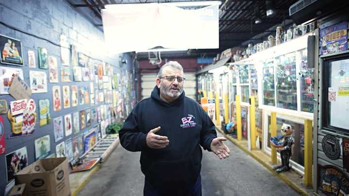 Watch as Mike "EZ" Zawahri hands out turkeys