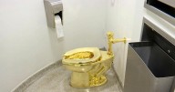 Flush with cash? Fully functional, solid gold toilet sells for $12.1M at auction