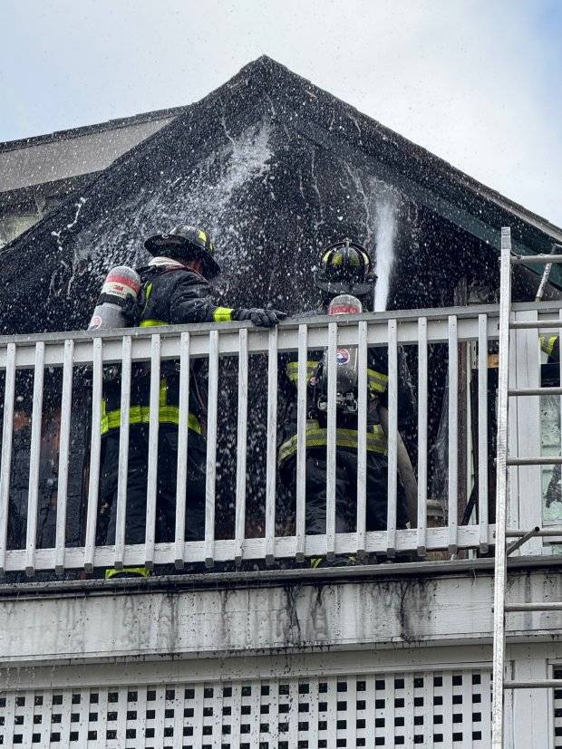 2-alarm blaze in Dorchester sends firefighter to hospital, displaces 2 residents