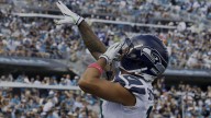 Jaxon Smith-Njiba accounts for historic share of Seahawks' passing game
