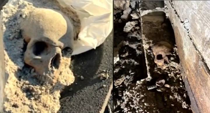 Workers uncover possible human skull encased in concrete at pier