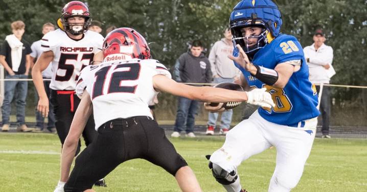 Carey tames Saints 40-36 in state football debut