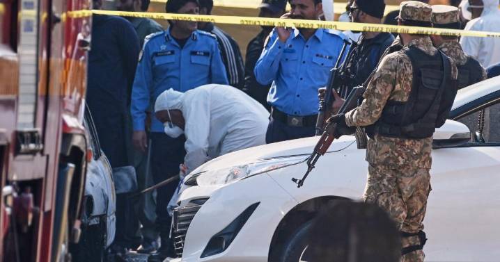 A suicide bomber targets an Islamabad court, killing 12 people and wounding 27, minister says