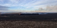 Grass fire burns hay bales in Stutsman County