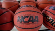 NCAA revokes eligibility of 6 more college basketball players as it continues sports betting probe