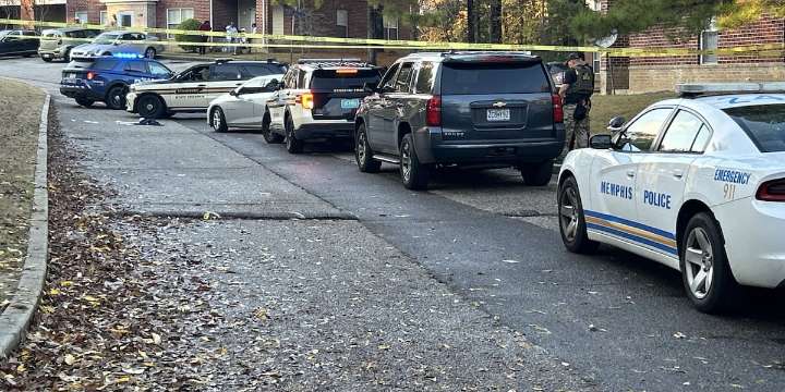 Police tape off crime scene at Whitehaven apartment complex