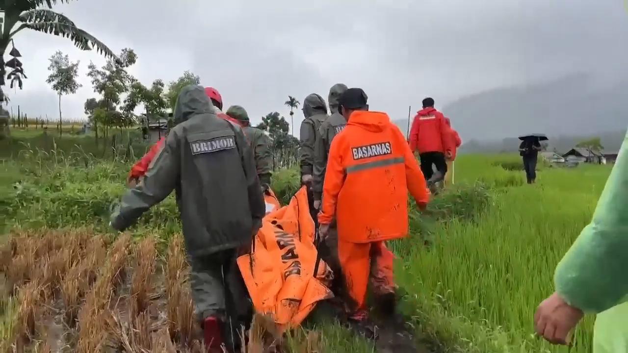 Indonesians assess damage after flash floods and landslides leave scores dead and dozens missing