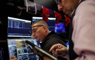 Wall Street indexes end lower after sharp reversal