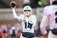 After new QB’s 300-yard game, Michigan State’s Jonathan Smith noncommittal