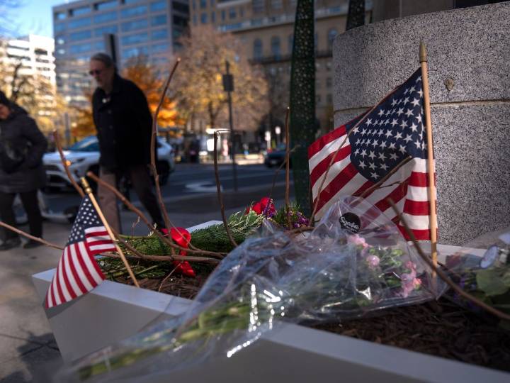 US halts asylum rulings as National Guard shooting suspect faces murder charge