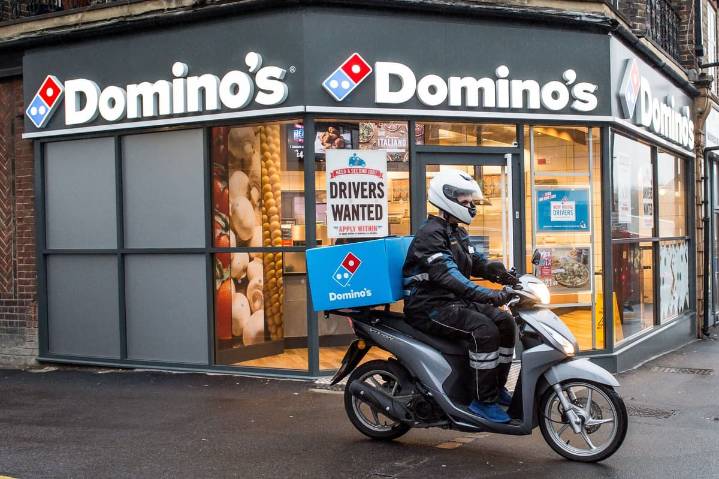 Boss of pizza giant Domino's steps down after boardroom strategy split