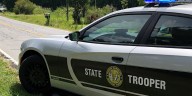 Trooper minorly injured after woman rear