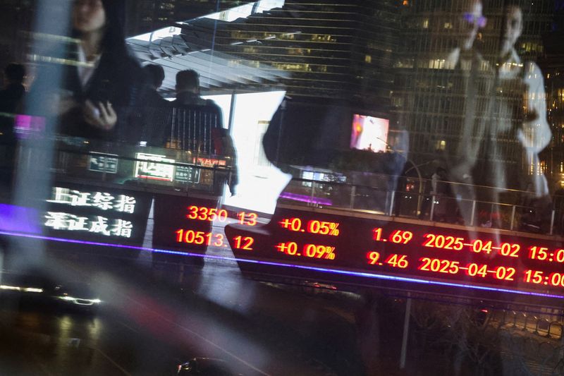 Shares in Chinese brokerages climb on CICC's plan to acquire two rivals