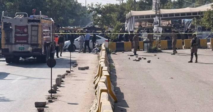 A suicide bomber targets an Islamabad court, killing 12 people and wounding 27