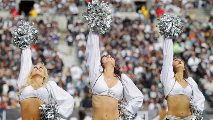 Flawless Raiderette sizzles in string bikini for sexy, only