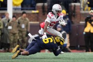 The Latest: Rivalry week could deliver changes in the top 10 of the AP Top 25