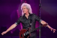 Queen guitarist changes stance on holograms, considers Mercury reunion