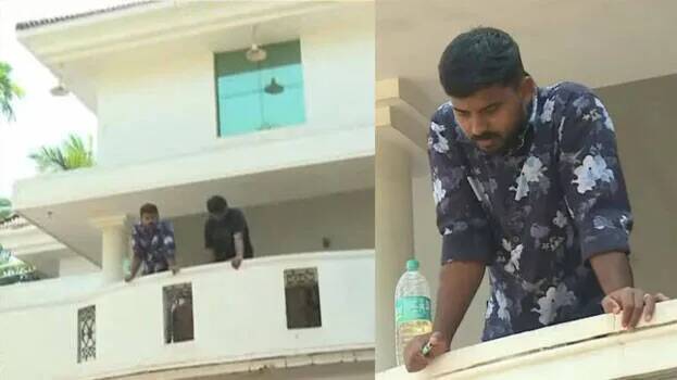 Protest against demolition of house for NH construction; Suicide threat with gas cylinder and diesel