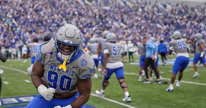 Ohio State gets top billing in opening CFP rankings; unranked Memphis still projected in playoff field