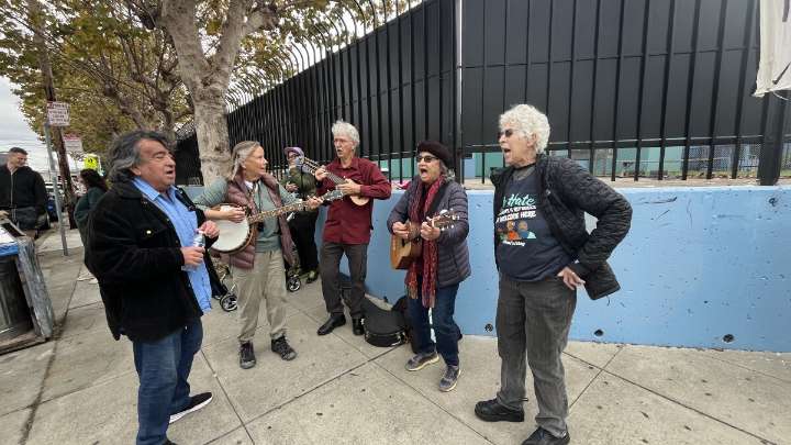 Oakland residents gather to protest ICE activity near two schools