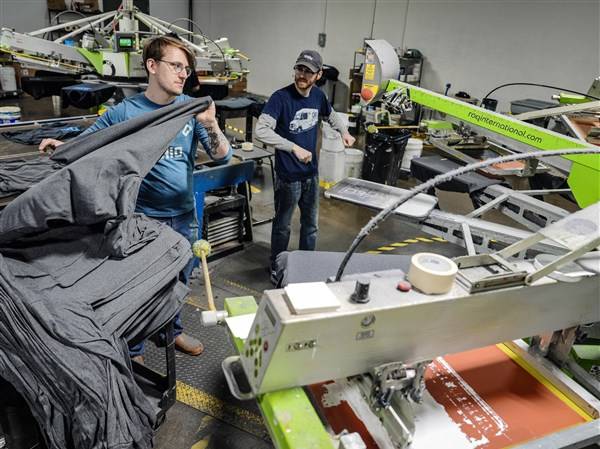 Shirts for fans of reading available via Jupmode and the library