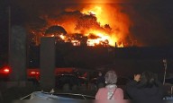 Fire razes 170 buildings in southern Japan, one missing