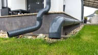 Hide The Eyesore Of Downspouts & Boost Curb Appeal With This Gorgeous DIY Solution