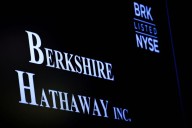 Berkshire profit rises, cash soars to record