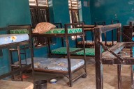Empty beds at school where 315 students and teachers were abducted by gunmen