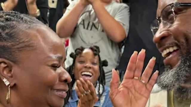 She roots for the Saints. He's a Falcons fan. Their love story took a special turn at the rival game