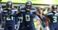 Seahawks' DeMarcus Lawrence has 2 fumble returns for TDs in first half vs. Cardinals