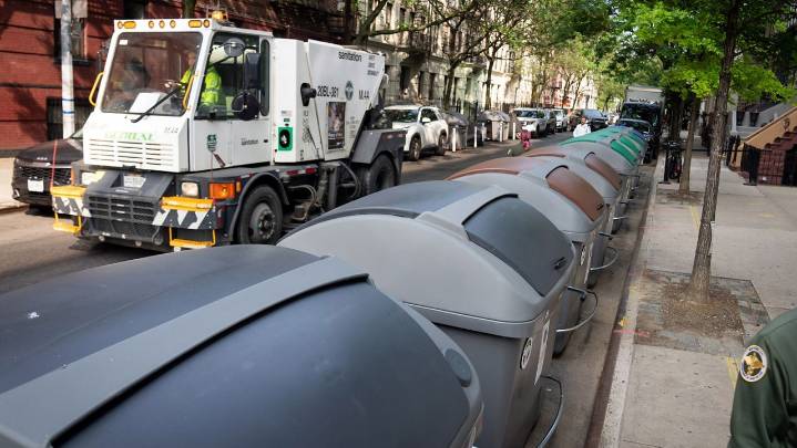 Large curbside trash container use could expand citywide