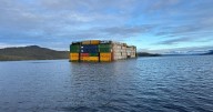 Cargo container removal begins on sinking barge off B.C.'s central coast