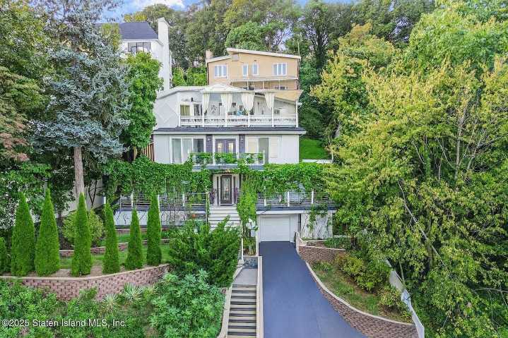 Staten Island Home of the Week: Grymes Hill property features home theater and private sauna listed for $1.7M