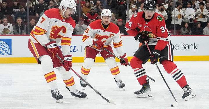 Bedard scores 3 times as Blackhawks beat Flames