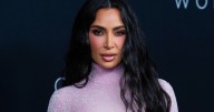 Kim Kardashian Turns Heads in Bejeweled Purple Outfit