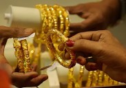 Gold climbs Rs 1,500 to Rs 1,27,300/10g on renewed safe