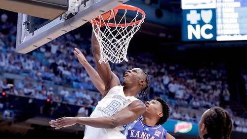 No. 25 UNC uses strong second half to beat No. 19 Kansas 87