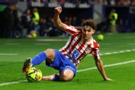 Soccer-Atletico trio to miss Argentina's friendly with Angola over vaccine issue