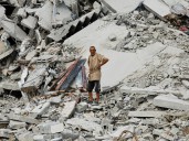 Israel kills 3 in Gaza, crews work to find thousands of missing in rubble