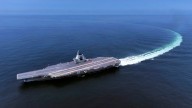 China’s latest aircraft carrier enters fleet as naval competition with the US heats up