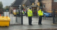 Body is found at a primary school as forensics remain at the scene