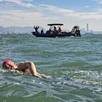 Delirium, painkillers: swimmers conquer Hong Kong seas over 21 hours