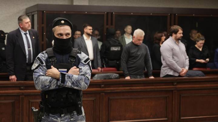 Russia convicts and hands life sentences to 8 people over attack on a key bridge to Crimea