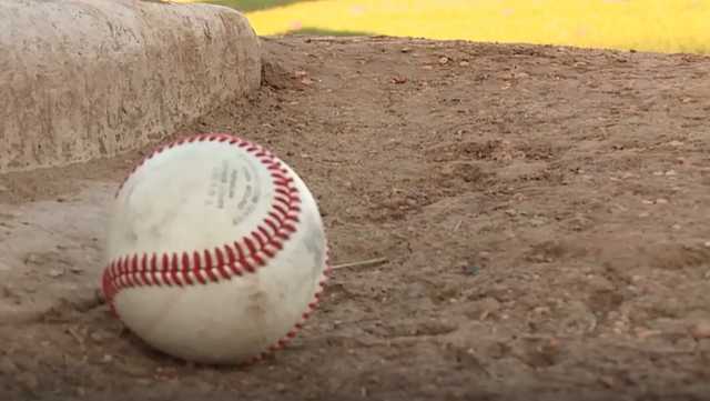 Off-duty officer, coach save teenager who collapsed on Indiana baseball field