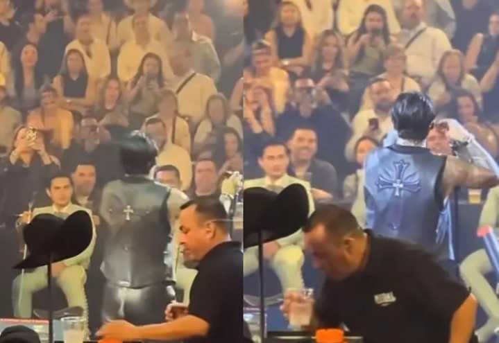 Equipo de Christian Nodal es visto oliendo y retirando sus bebidas en pleno concierto