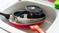 Remove Grease And Grime From All Your Cookware With A Laundry Room Essential